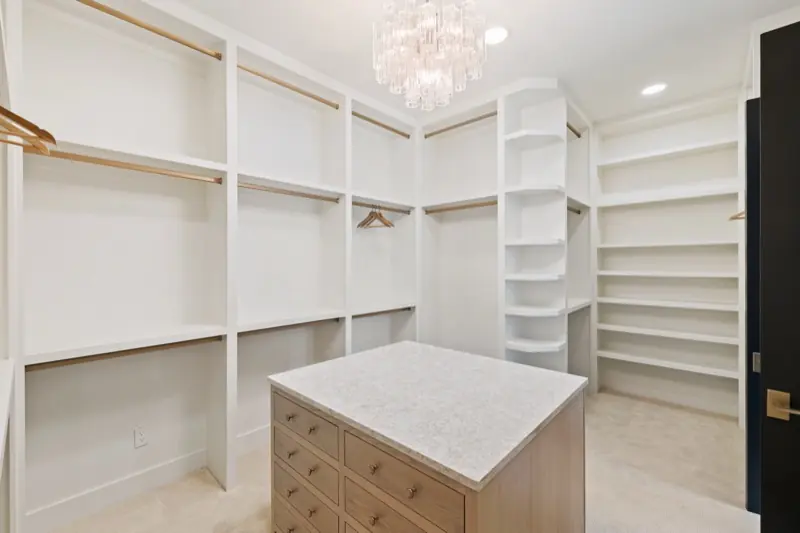 Walk-in closet with chandelier