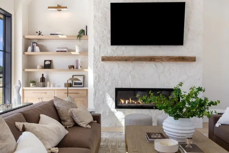 Living room with limestone fireplace