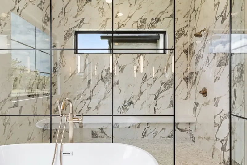 Marble wet room with tub and shower